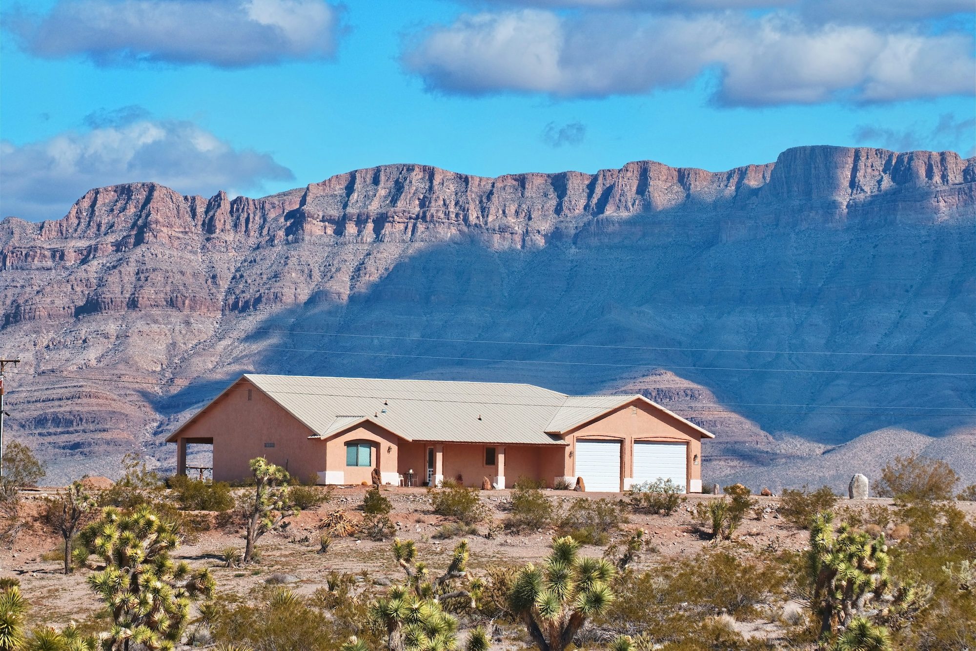 Desert home with elevated cooling and water costs